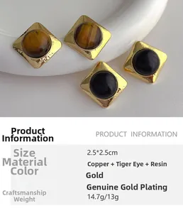 Detailed specs of square vintage stud earrings featuring tiger eye stone and resin