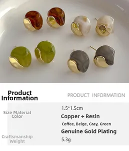 Irregular resin stud earrings in earth tones with gold plating and size details