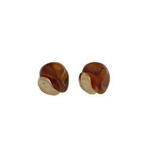 Asymmetric resin amber and gold metal stud earrings with s925 silver needles