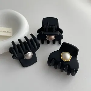 Tre fermagli per capelli nero opaco per coda alta con perle e eleganti bordi dorati