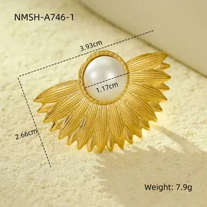 Detailed view of golden fan-shaped pearl brooch with exact size and weight specifications