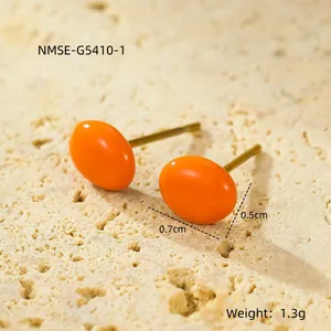 Detail showing 0.7x0.5cm orange oval stud earrings with 18k gold plating dimensions