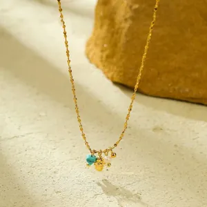 Gouden roestvrijstalen ketting met turquoise hart, zon hanger en kleine parel