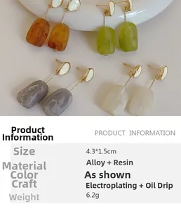 Detailed size and material specs for geometric resin earrings in various colors