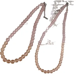 Summer pink glass beaded necklace with faceted details and adjustable silver chain