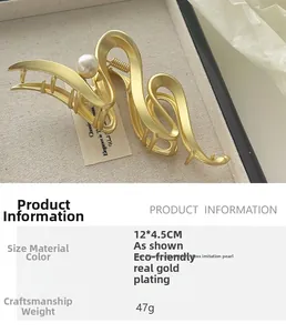 Detailansicht der 12 cm goldbeschichteten Haarklammer mit einer großen Perle