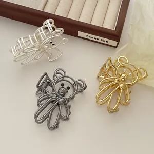 Elegantes pinzas para el cabello de metal hueco con forma de oso, oro, plata y gris para mujer