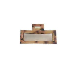 Franse vintage haarklem met luipaardprint en goudkleurige metalen veer