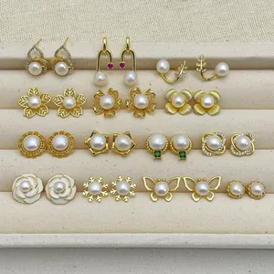 Collection of pearl earrings featuring floral, butterfly and geometric designs in gold finish