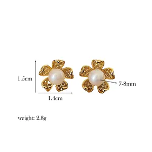 Detailed view of hollow floral gold earrings with measurements and 7-8mm pearls