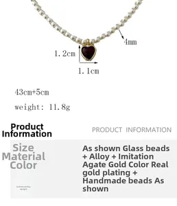 Detail view of heart agate pendant pearl necklace with dimensions and material specs