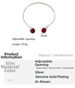 Detail view of silver open bangle with 8mm red agate beads and metal alloy texture