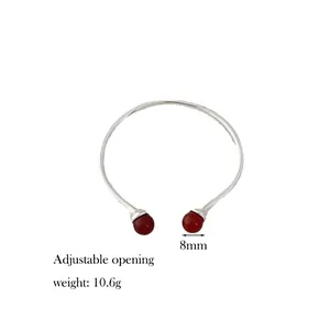 Detail of adjustable silver cuff with 8mm red agate beads and 10.6g weight info