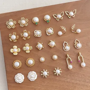 Elegant natural freshwater pearl earrings set with gold plating in assorted geometric designs