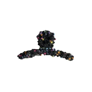 Pinza para el pelo de punto negro con detalles coloridos para coleta alta