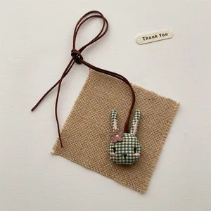 Cute green plaid fabric bunny plush pendant necklace with brown embroidery details