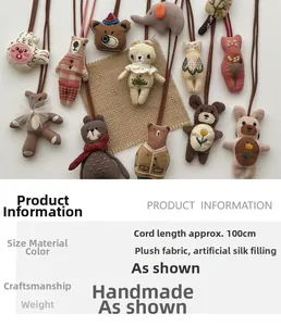 Detail of handmade cartoon plush charms with embroidery and 100cm lanyards