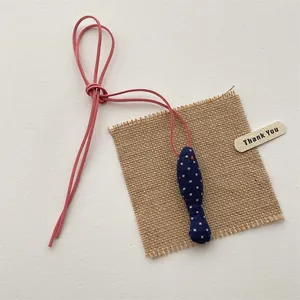 Handmade fish fabric pendant in navy blue polka dot with pink faux suede long cord