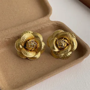 Minimalist fabric rose earrings with golden petals and s925 silver needles for women