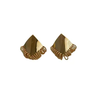 Minimalist geometric gold earrings with fan-shaped design and twisted metal edge details