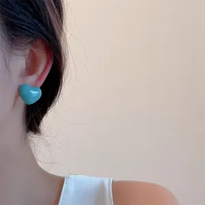 Sweet mint green heart shaped stud earring for women in a minimalist elegant style
