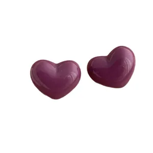 Polished purple heart-shaped stud earrings in a glossy minimalist square setting style