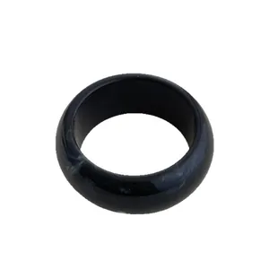 Modern irregular black resin wide bangle with white marble texture and glossy finish