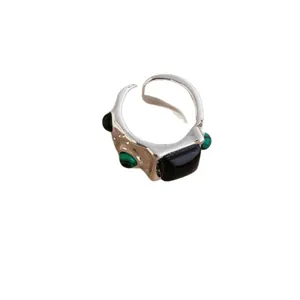 Vintage irregular silver ring with large rectangular black stone and green bead accents