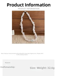 Detailed view of handmade irregular white stones necklace with blue-green accent stone