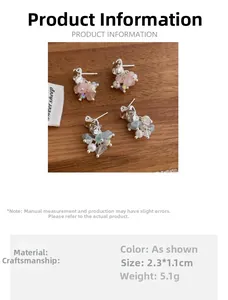 Detail view of natural stone tassel earrings with pink crystal, aquamarine and pearls