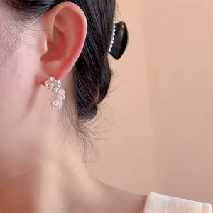 Elegant natural pink stone tassel earrings with silver textured metal for women