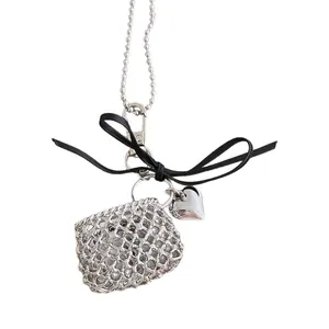 Zilveren ketting met hart hanger, zwarte strik en metalen kralenketting