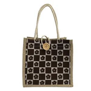 Floral canvas tote bag with brown checkered pattern, jute texture and wood button closure