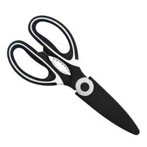 Detail of multi-functional kitchen shears with ergonomic handles and black protective sheath