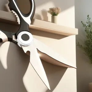 Close-up of multi-functional stainless steel kitchen scissors with a serrated handle detail