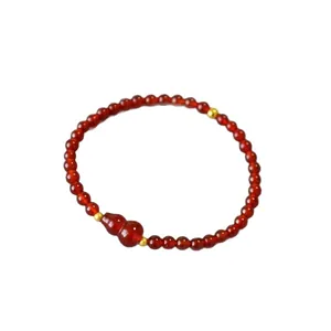 Elegante bracciale in agata rossa con ciondolo a forma di zucca Wu Lou e perle dorate