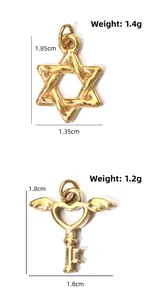 Close-up of golden hexagram star and heart wing key pendants with weight details