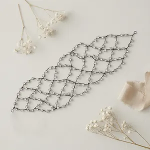 Exquisite bridal hairband with black woven mesh and sparkling rhinestones on art paper