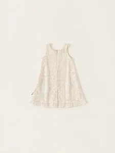 Girls ivory floral lace sleeveless dress with ruffled hem and bohemian vacation style