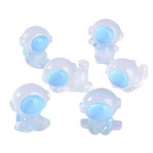Set of 6 mini luminous astronaut resin figurines in blue and white for desktop decor