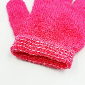 Exfoliating bath glove in bright magenta with textured fabric for gentle skin scrub