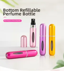 Detailed view of colorful 5ml bottom-refill perfume bottles with clear view window