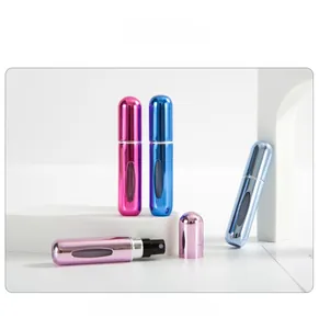 Detail view of colorful 5ml portable perfume atomizers with transparent window