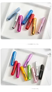 Close-up of 5ml refillable perfume bottles with visual window in matte and glossy finishes