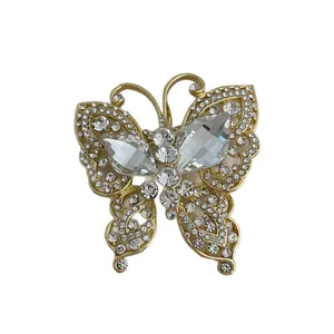 Elegante broche de mariposa dorado con cristales vintage y diamantes de imitación