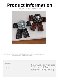 Detail of camellia plaid bow brooches featuring elegant tweed fabric and large pearl accents