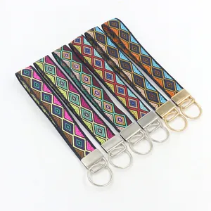 Set of 6 colorful bohemian embroidered keychains with geometric diamond patterns and rings