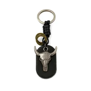 Retro bull skull head pendant keychain made of black cowhide and silver alloy metal