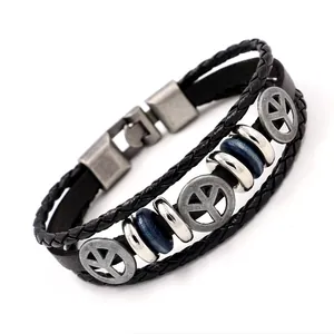 Bracelet multicouche en cuir tressé avec symboles de paix argentés et perles bleues