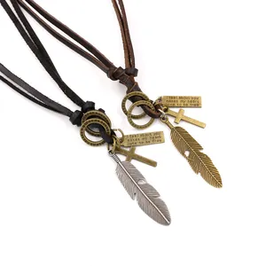 Collier vintage en cuir avec pendentif plume en alliage aux finitions argent et bronze